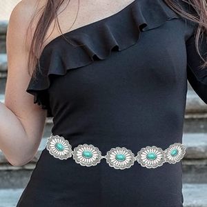 New concho silver and turquoise color chain belt.  Fits up to 50"